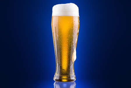 Frosty glass of light beerの写真素材