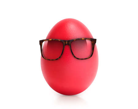 red egg isolated on whiteの写真素材