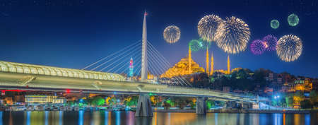 Ataturk bridge, metro bridge and beautiful fireworks, Istanbul, Turkeyの写真素材