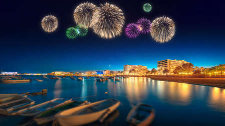 Beautiful fireworks under Ibiza island night view in San Antonioの写真素材