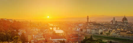 Arno River, Ponte Vecchio, Vecchio Palace, Basilica of Santa Croce at sunset Florenceの写真素材