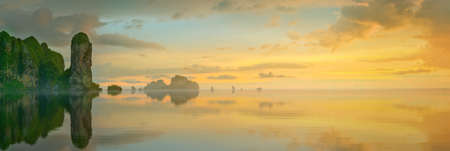 Beautiful image of sunset with colorful sky and Longtail boat on the sea tropical beach. Thailand