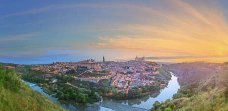 Panoramic view of ancient city and Alcazar on a hill over the Tagus River, Castilla la Mancha, Toledo, Spain.の写真素材