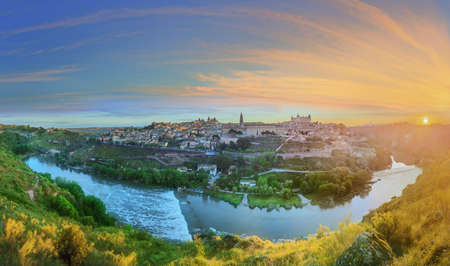 Panoramic view of ancient city and Alcazar on a hill over the Tagus River, Castilla la Mancha, Toledo, Spain.の写真素材
