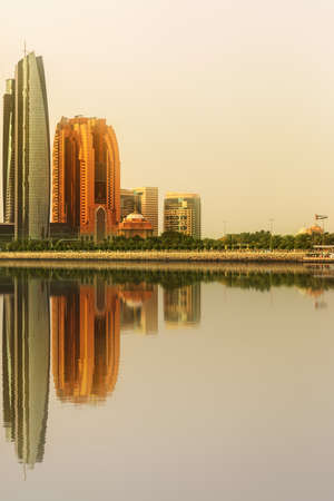 View of Abu Dhabi Skyline and Al Bateen marina at sunset, United Arab Emiratesの写真素材