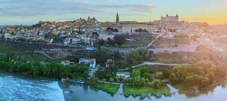 Panoramic view of ancient city and Alcazar on a hill over the Tagus River, Castilla la Mancha, Toledo, Spain.の写真素材