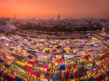 Tropical beach with rocks on sand coast of oceanの写真素材