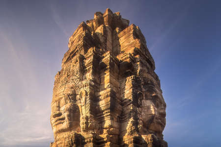 Sunrise view of ancient temple Bayon Angkor Watの写真素材