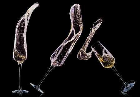 Set of luxury champagne glasses isolated on a blackの写真素材