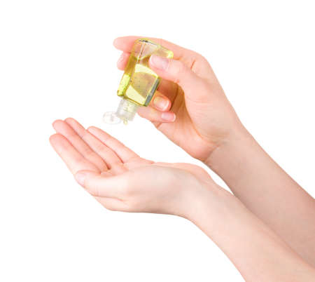 Woman hands use antibacterial gel sanitizer isolated on white background with clipping path. Concept...