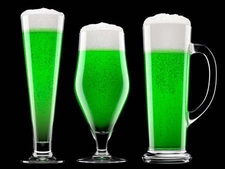 Set of fresh green beer in different mugs with bubble froth isolated on black.の写真素材
