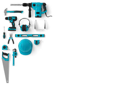 Top view of green construction tools for repair and installation on white