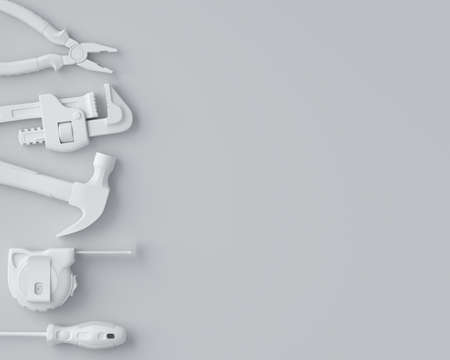 Top view of monochrome construction tools for repair and installation on whiteの写真素材