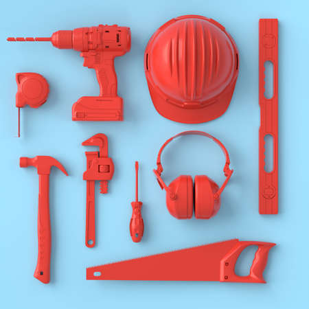 Top view of monochrome construction tools for repair on blue and redの写真素材