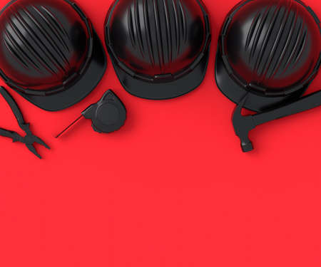 Top view of monochrome construction tools for repair on red and black