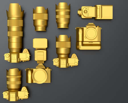 Top view of gold designer workspace and gear like nonexistent DSLR camera, lens and speedlight flash...