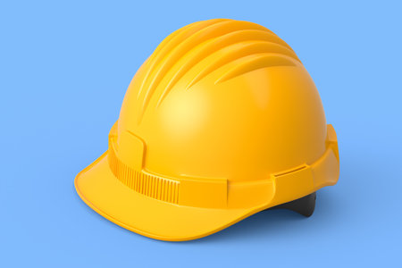 Yellow safety helmet or hard cap isolated on blue background. 3d render and illustration of headgear and handyman toolsの写真素材
