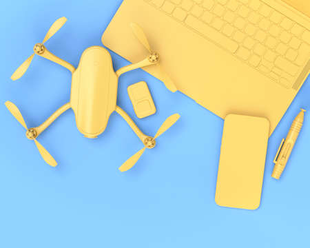 Top view of designer workspace and photography gear on blue table backgroundの写真素材