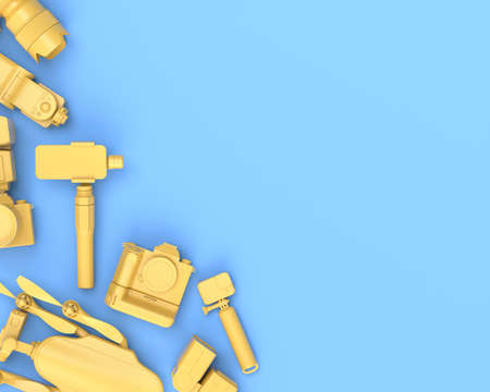 Top view of designer workspace and gear like nonexistent DSLR camera, mobile phone, drone and action camera on selfie stick on blue background. 3d rendering of accessories for live streamingの写真素材