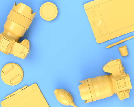 Top view of gold designer workspace and gear like optical lens, tablet, digital camera and blower bulb on blue background. 3d rendering of accessories for illustrator and photography toolsの写真素材