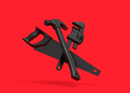 Flying view of black construction tools for repair on red background