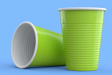 Set of plastic party cup for college ping pong game on blue background.の写真素材