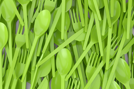 Heap of disposable utensils like spoon, fork and knife on white background. 3d render concept of save the earth and zero wasteの写真素材