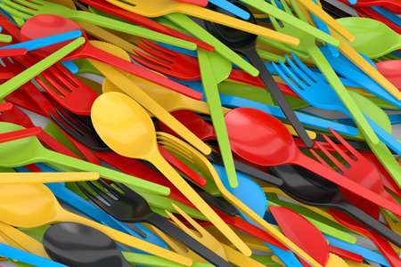Heap of disposable utensils like spoon, fork and knife on white background. 3d render concept of save the earth and zero wasteの写真素材