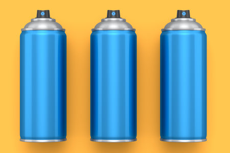 Set of spray paint cans isolated on yellow background. 3d render spray paint bottle and dispenserCan of spray paint isolated on white background. 3d render spray paint bottle and dispenserの写真素材