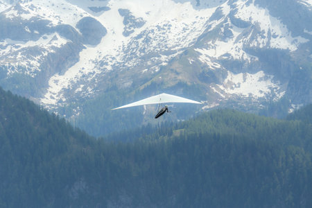 Hang gliding above mountain valley near Jenner mount Berchtesgaden National Park