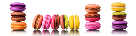 Stack of french colorful macaroons in row isolated on white background with clipping path.の写真素材
