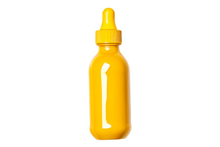 Mustard in clear plastic bottle isolated on white transparent backgroundの素材