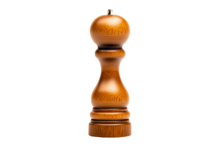 Wooden pepper grinder surrounded by peppercorns isolated on white transparent background.の素材