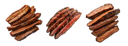 Slices of grilled beef steak isolated on white background. Top view.の素材