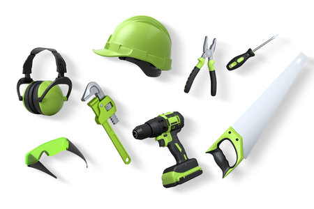 Various construction and safety tools including helmet, drill, pliers, and goggles isolated on white background with clipping path, concept of labor gearの写真素材
