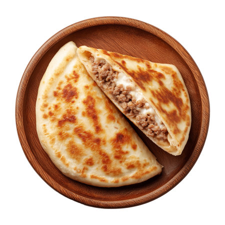 Grilled stuffed flatbread like Arayes pita filled with seasoned minced meat on wooden plate, isolated on white transparent background, concept of traditional Arabic street foodの素材
