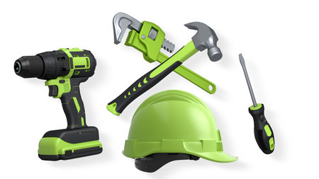 Various construction tools including wrench, hammer, pliers, and helmet isolated on white background...