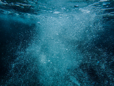 Underwater bubbles, under the Mediterranean sea, very suitable landscape picture for backgrounds, blue background of underwater bubblesの写真素材