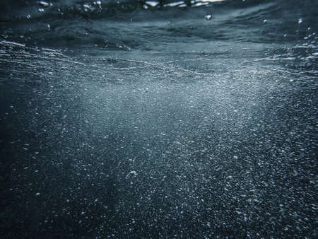 Underwater bubbles, under the Mediterranean sea, very suitable landscape picture for backgrounds, blue background of underwater bubblesの写真素材