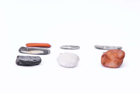 pebbles isolated, Stones isolated on a white background, Collection of various sea pebble stones on white background. flat lay, pebble beach isolated on white, Smooth sea rocks, colorful .の写真素材
