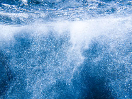 Underwater bubbles, under the Mediterranean sea, very suitable landscape picture for backgrounds, blue background of underwater bubblesの写真素材