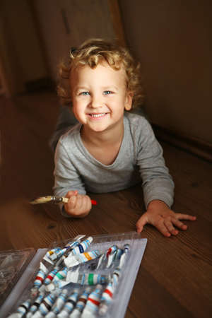 Kid is painting.の写真素材