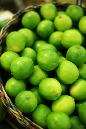 lime in basketの写真素材