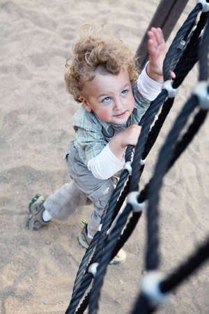 Little boy in a playgroundの写真素材