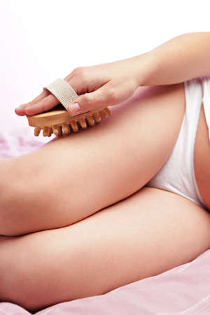 Pregnant woman in bed. Skin care.の写真素材