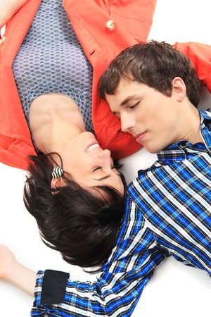 Young love couple smiling. Over white backgroundの写真素材