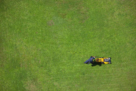 A man mowing the lawnの写真素材