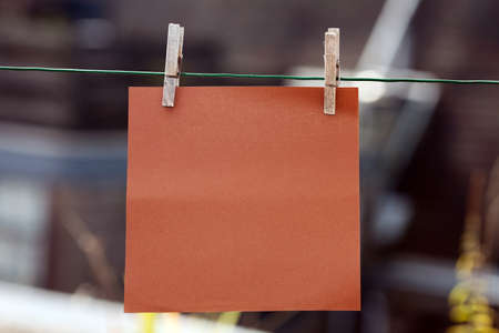 paper card hanging on stringの写真素材