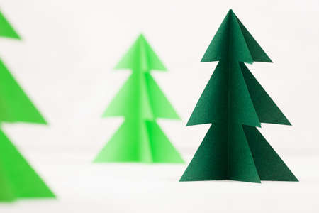 Paper Christmas trees. Winter background. Christmas cardの写真素材