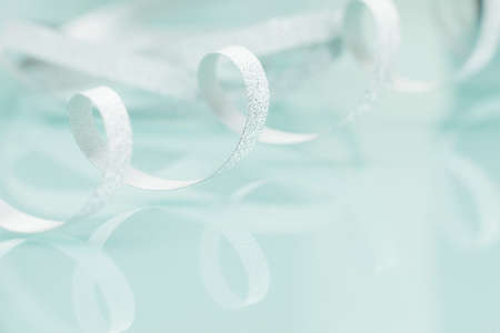 Silver bow on light background. Abstract background,の写真素材